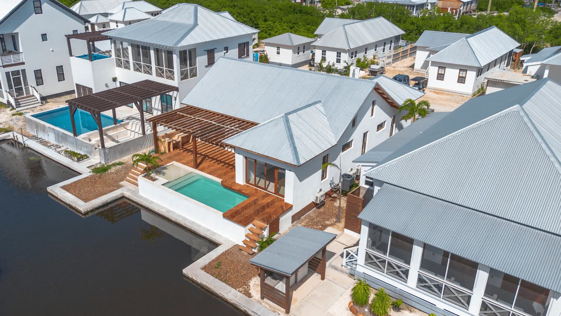 Canal-front luxury home with private pool in Mahogany Bay Village, Belize